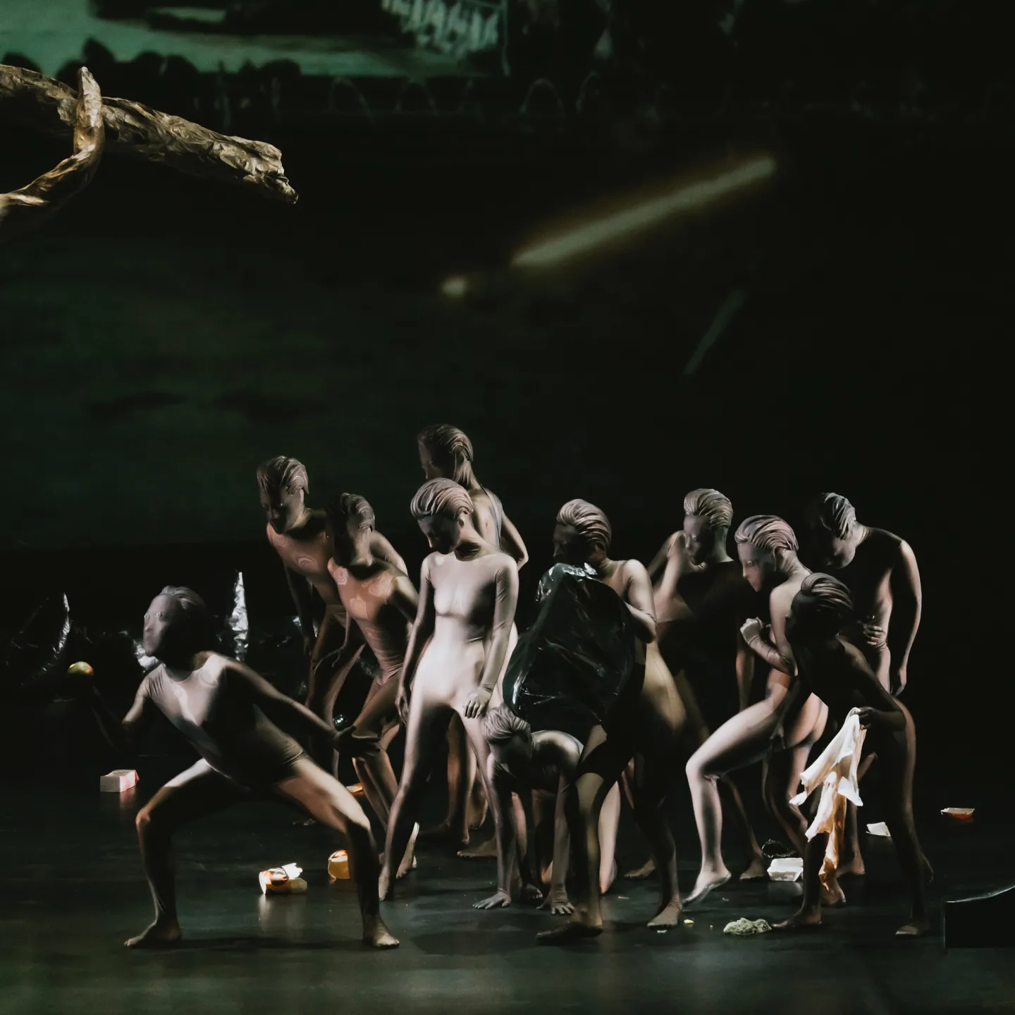 Opera ensemble in a dramatic scene on stage.